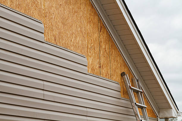 Professional Emergency Siding Repair technician working in Mineral Ridge, OH